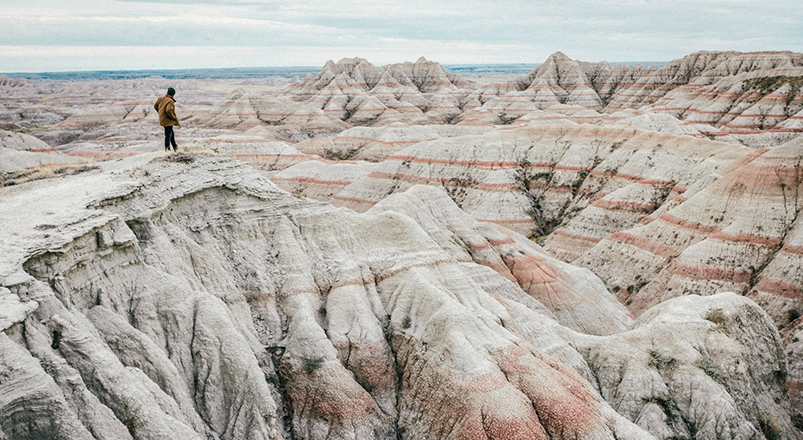 man-hiking-in-the-badlands